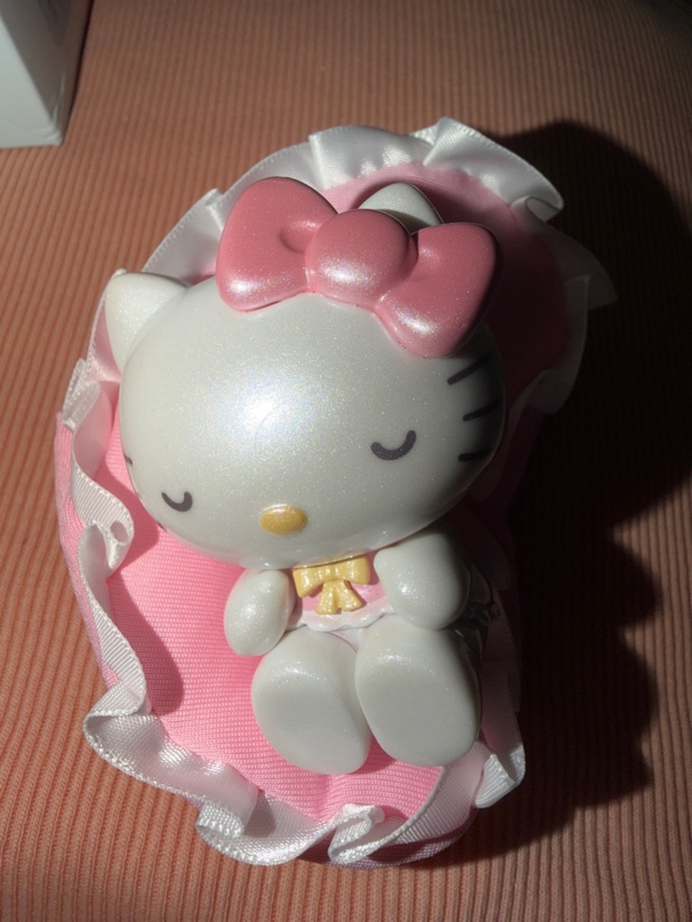HELLO KITTY Sanrio Family Soft Sofa Series," sitting on a sofa